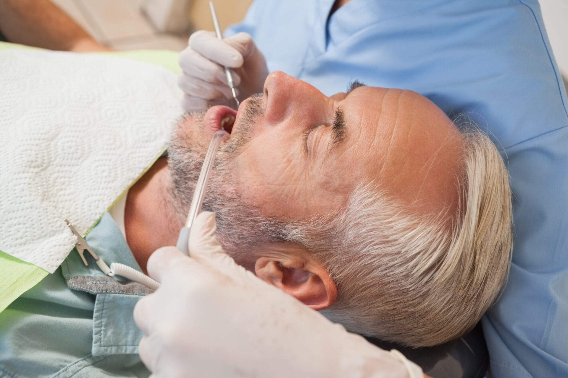 a man getting his teeth checked